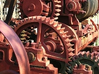https://upload.wikimedia.org/wikipedia/commons/thumb/2/2c/Rock_crusher_gears.jpg/350px-Rock_crusher_gears.jpg
